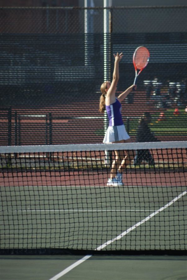 SMASHING SERVE: Kate Southworth (9) prepares for a serve.