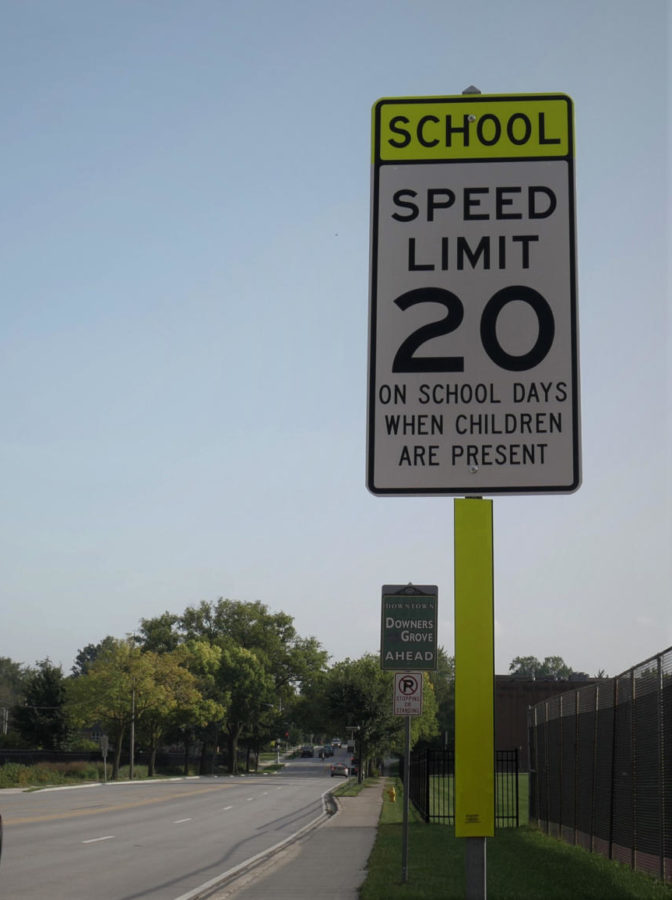 SCHOOL ZONE: A sign placed near the Main Street crossing warns of the speed limit change, from 25 miles per hour down to 20, in the upcoming area. 