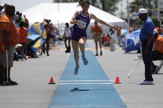 HIGH STAKES: McKenna Cinotte (11) competes at the 2019 IHSA state meet. Like Cinotte, athletes lost the opportunity to compete