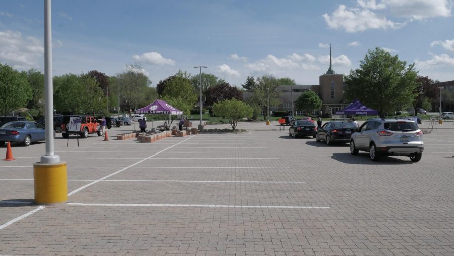 Several tents were set up in the parking lot for students to drive through. Each one had a designated amount of letters in order to sort students alphabetically to eliminate traffic. 