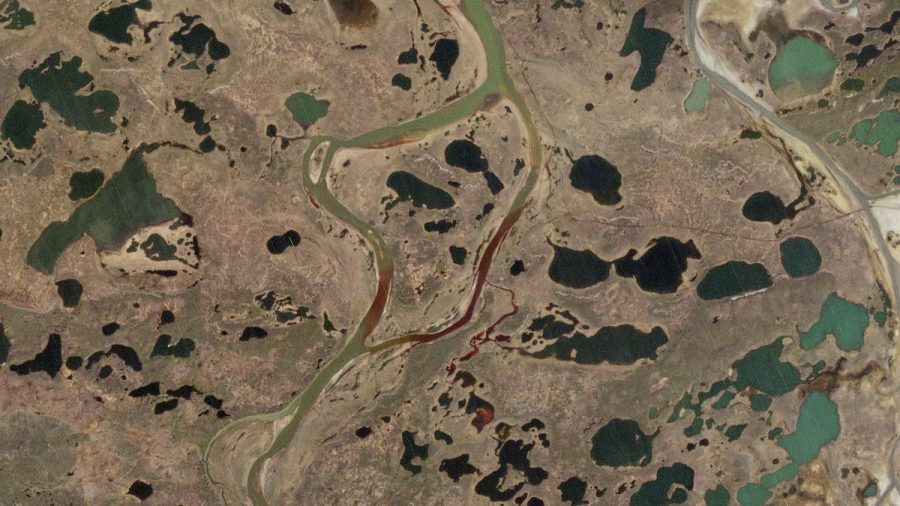 SEEPING IN: satellite imagery from May 31 shows oil spilled into rivers near Norilsk, Russia, coloring the water red.