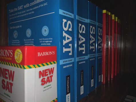 PRACTICE, PRACTICE, PRACTICE: a photo of SAT and ACT practice books, representing the only version of the tests that many students have been able to take in the last several months.