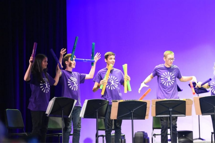 MIC DROP: Trojan Thunder throws their Boomwhackers after finishing their 2019 Talent Show performance.