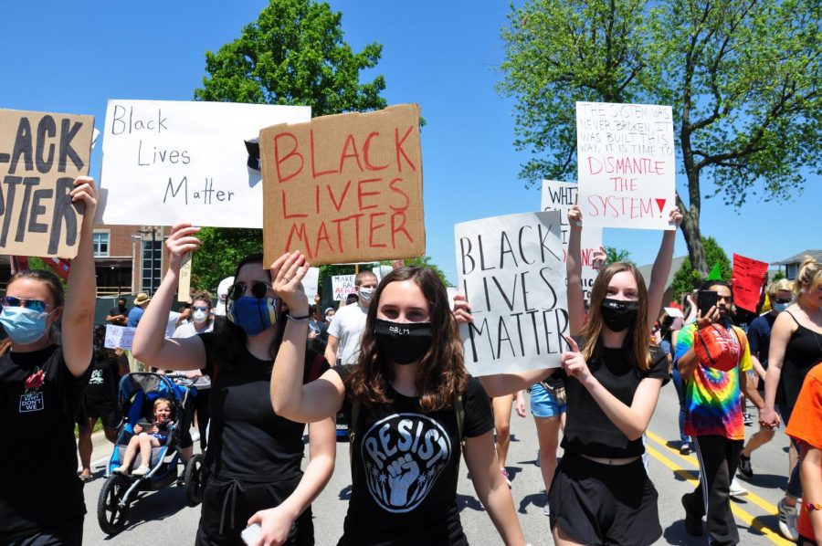 Marching for racial equality: Gwen Casten, Claire Gorey, and Audrey Gorey protesting at the Say Their Names rally, June 7, 2020
