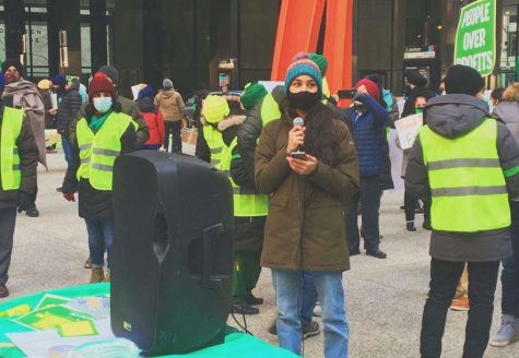 USING HER VOICE: Amneet Kaur (10) speaks about the Farmers Protest at a protest in Chicago.