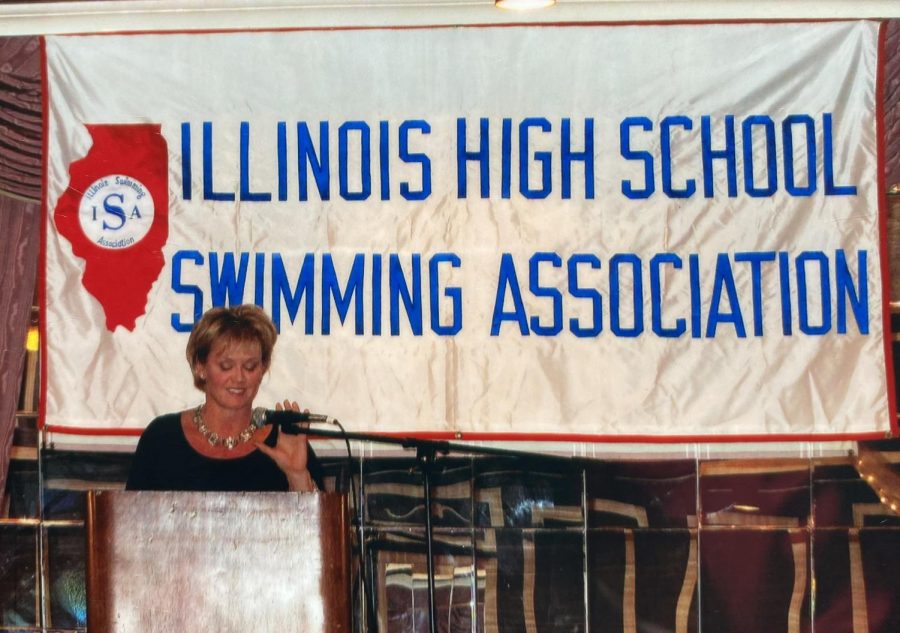 HONORING A LEGACY: Jennifer Heyer-Olsen gives induction speech as she is welcomed in to the IHSA Swimming hall of fame.