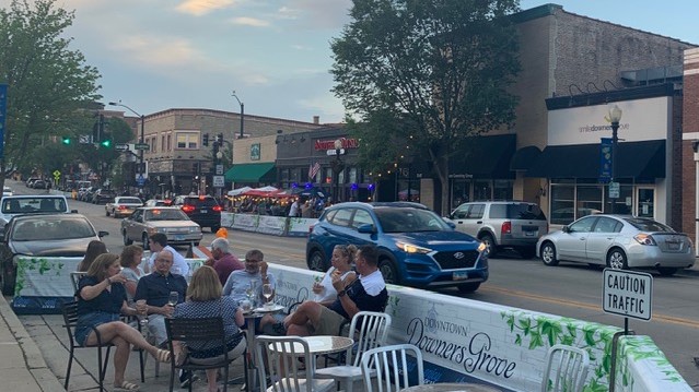 A HOPEFUL HORIZON: From packed restaurants to crowded streets, Downers Grove is beginning to show signs of normalcy this summer after a year of desolate roads and silent shops.