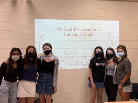 FACING THE PROBLEM: Akshi Mistry (12), Madeline From (12), Heather Ramsey (12), Maddy Mcgovern (12), Helen Larkin (12), and Veronica Lasota (11) present to Health Department on new considerations
