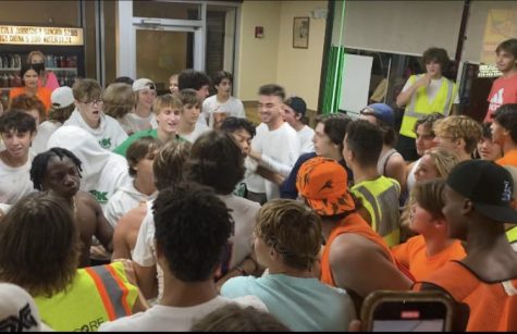 DEFENDING LOS: DGN students in construction outfits square off with the white-shirted York students. The confrontation led to a food fight and police involvement.