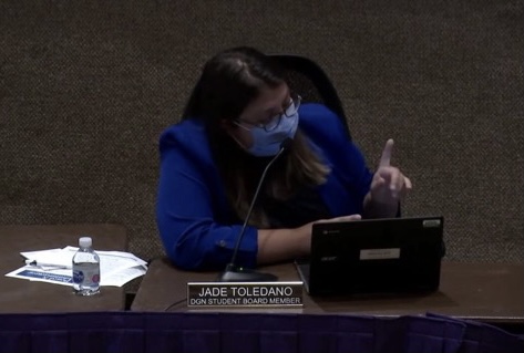 SPEAKING UP FOR STUDENTS: Jade Toledano (12) briefs school board on current and upcoming student activities at DGN.