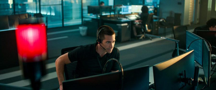GETTING A CALL: Joe Baylor (Jake Gyllenhaal) receives a 911 call from an abducted woman Emily Lighton (Riley Keough), which sets the scene for the movie.
