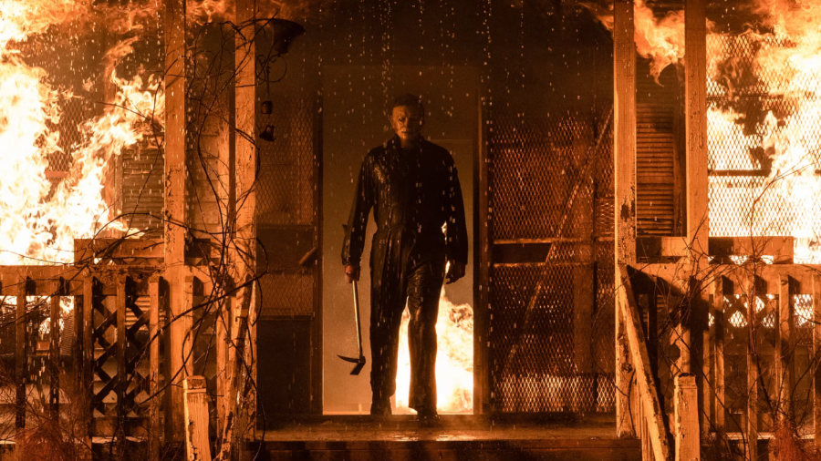 YOU CAN’T KILL THE BOOGEYMAN: Masked maniac Michael Myers (portrayed by James Jude Courtney, Nick Castle and Airon Armstrong) emerges from the blazing compound of Laurie Strode (Jamie Lee Curtis), in which Strode unsuccessfully burned him to death at the end of 2018’s Halloween.