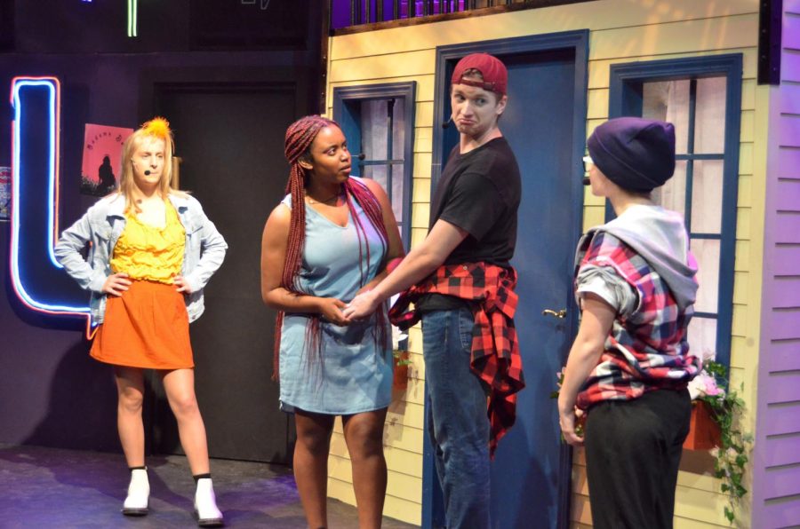 DROPPING A BEAT: Grace Troelstrop (11), Tana Purcell (11), Azreal Brandt (12), and Sydney Miller (11) act out a fast-paced scene in the school production of Bomb-itty of Errors. 