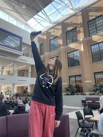 CONNECTION CHAOS: Senior Violet Mitchell grows restless as Wi-Fi connections drop in and out on her devices.