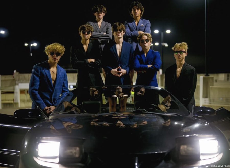 LOOKING DAPPER: Top seven runners pose for the camera in a convertible in sport coats and sunglasses to intimidate their competitors.