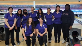 STRIKE: Bowling team poses for a picture after their first win this season. 