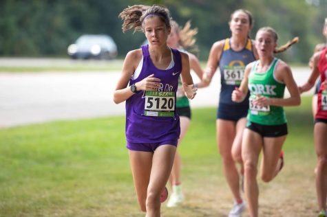 RACING TOWARDS VICTORY: Lilly Eddington (freshman) runs for girls varisty XC