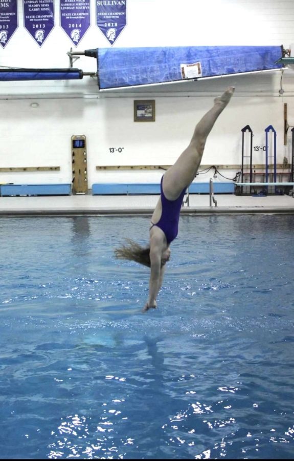 MAKING A SPLASH: Allison Mulvey executes a dive that would earn her a high score. 