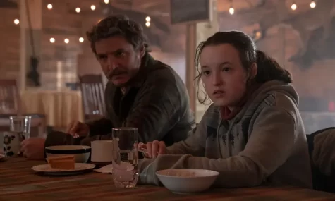 A PROPER MEAL: Ellie and Joel eat a meal in the town where they meet Tommy. 