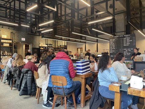 PACKED: The small coffee shop is full with people on a sunday morning 
