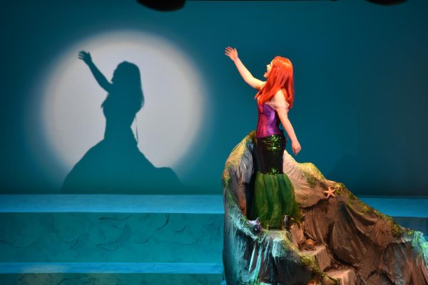 PART OF YOUR WORLD: Sydney Miller (12) takes the stage in the opening song of The Little Mermaid. 