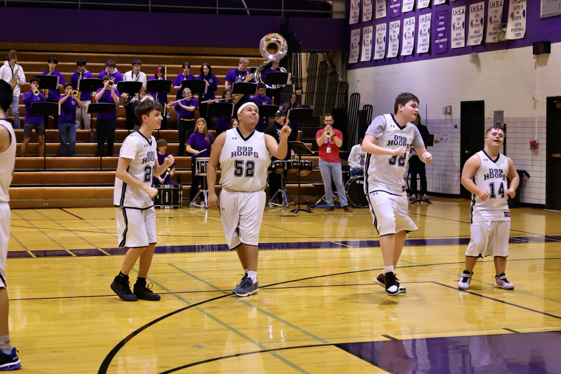 NOTHING BUT NET: Team Three celebrates between plays with a dance party