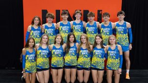 BEYOND DOWNERS GROVE: DGN boys' and girls' cross country pose together in their Nike sponsored uniforms. They were the only school in the country with both the boys' and girls' teams represented nationally at NXN