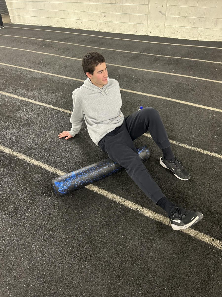 ROLLING OUT: Danny Graham uses a foam roller on his hamstrings to relieve his muscles and get the tightness out after a hard leg workout.
