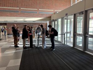 Scanning In: DGN Students use Infinite Capmus to scan into the building.
Photo by Mallory Croft
